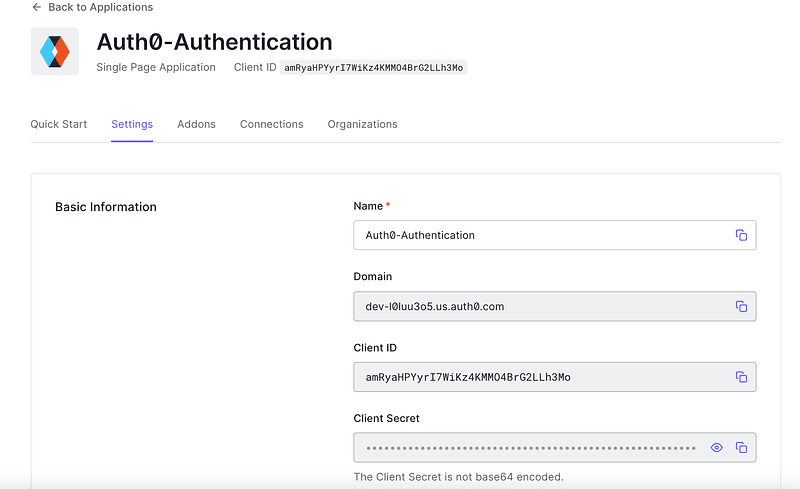 Auth0 application settings page showing domain and client ID details